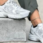 white new balance trainers